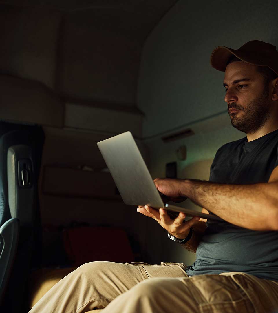 Trucker Taking Class | Online Courses | CNS Courses